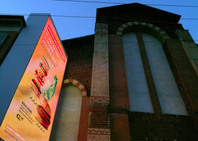 HUGE display screen with changing ads, (this one for IKEA—there are 5 in Milano) next to this historic church, S. Maria delle Grazie.