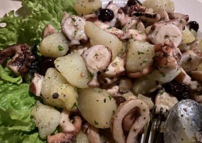 Warm "salad" of octopus, potato and taggiasche olives. My favorite