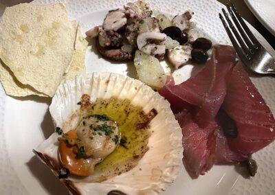 Pane carasau, octopus and potato, smoked tuna, scallop