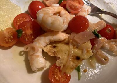 Shrimp, tomatoes, pane carasau