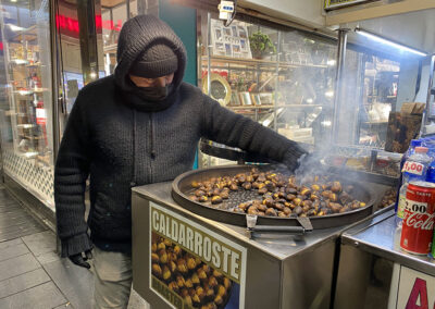 Chestnuts roasting on a closed fire.