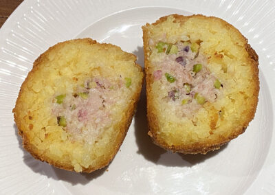 Arancini, filled with speck and pistacchio