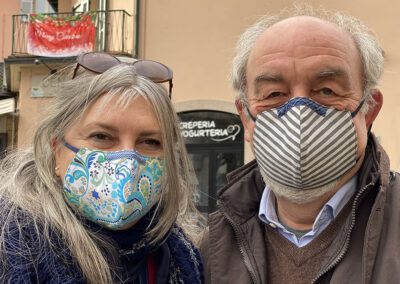 Donatella and Antonio wearing their new masks