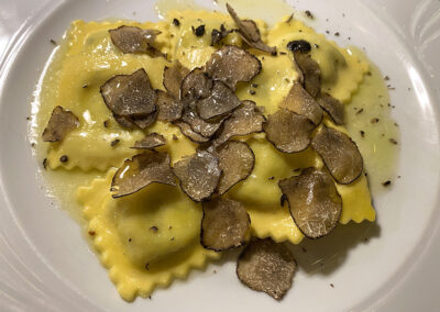 Tortelli filled with squash, with black truffle